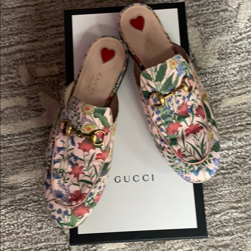 Size 37 floral Gucci slides.